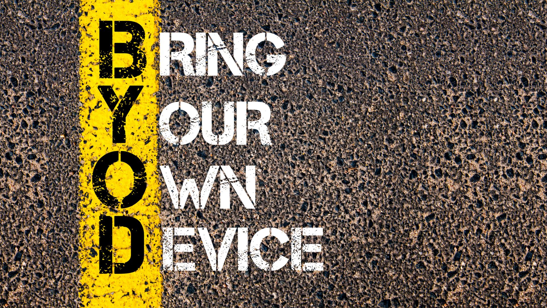 The acronym BYOD painted onto a tarmac road.